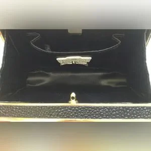 Henri Bendel Black and Tan Animal Print Pony Hair and  Henri Bendel Gray Patterned Calf Hair Clutch main image 1